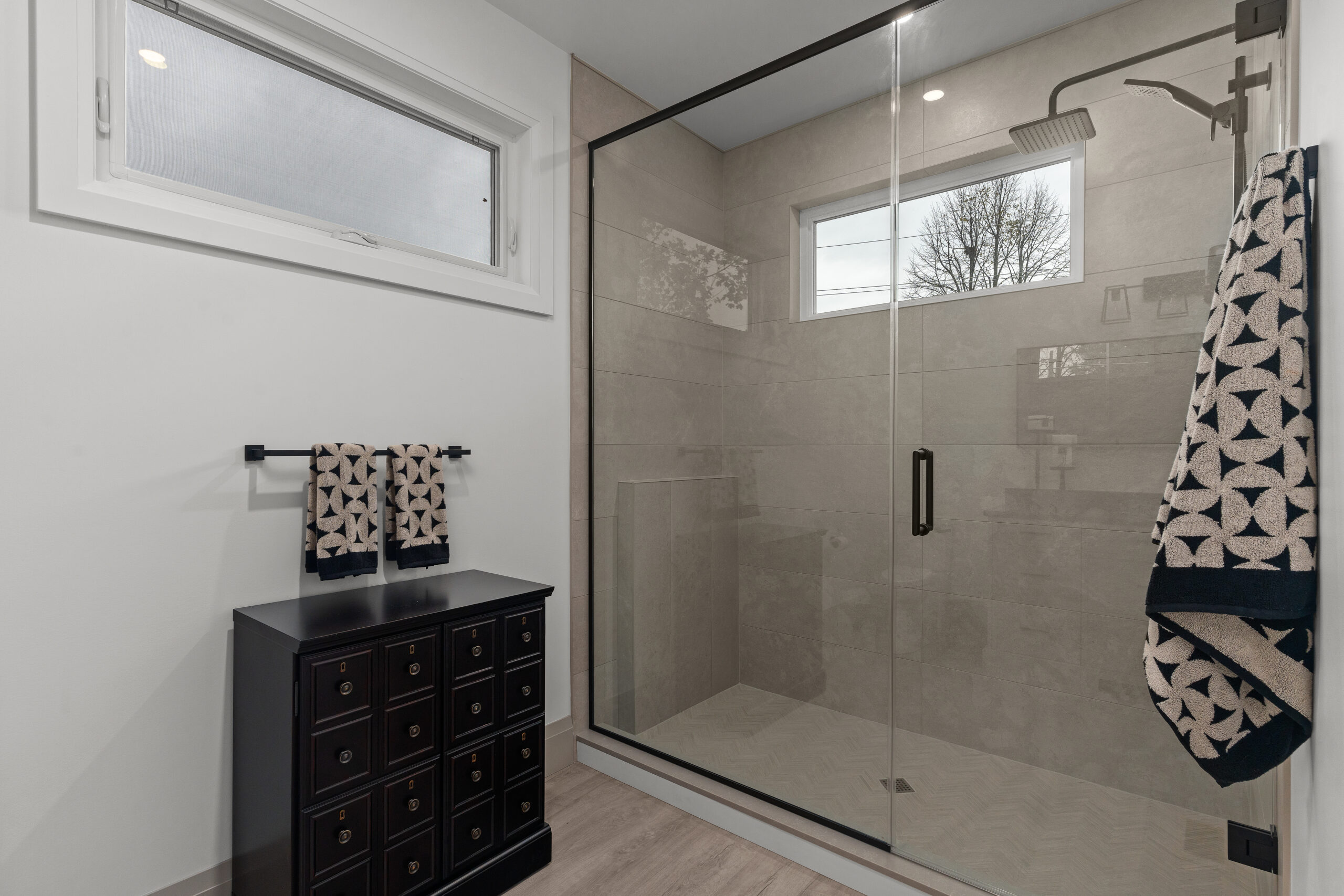 Bathroom design with walk-in glass shower
